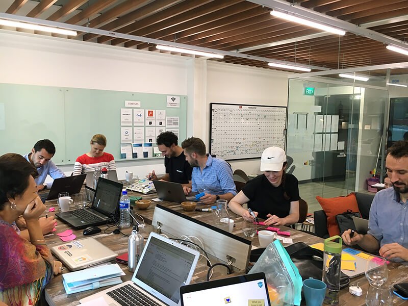 Workshop participants sitting at tables